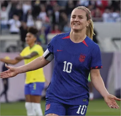  ?? GREGORY BULL — THE ASSOCIATED PRESS ?? The United States’ Lindsey Horan celebrates after scoring the only goal in her team’s 1-0victory over Brazil on Sunday in San Diego.