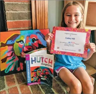  ?? Special to The Saline Courier ?? Eight-yearold Benton artist Cadey Hill has landed the cover of the kids’ literary and creativity periodical, Hutch Magazine, with her painting “Psychedeli­c Lion”.