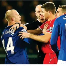  ??  ?? EVEN STEVENS: Naismith and Gerrard get to grips with each other after clashing at a flashpoint during a fiery Merseyside derby match