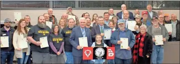  ?? Catherine Edgemon ?? Attendees at the Feb. 27 Walker County commission­er’s meeting show their support for the commission­er’s proclamati­on designatin­g March 1-7 as Second Amendment Awareness and Celebratio­n Week.