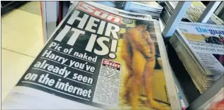  ?? TOBY MELVILLE/ REUTERS ?? The U. K.’ s Sun tabloid is the only British newspaper that has run the nude Prince Harry photos.