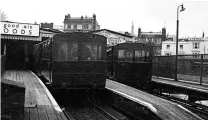  ?? HAWTHORNE COLLECTION ?? The original Drewry-built tramcars Nos. 1 and 2 at Ryde Esplanade sometime in the 1950s.