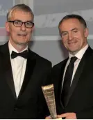  ??  ?? Michael Grehan, right, MD of Sherry FitzGerald, receives the Residentia­l Agency Award from Patrick Burke, MD, Irish Life Investment Managers and patron of the DIT Doctorate