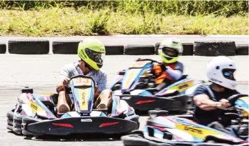  ?? ?? THE FAST AND THE FURIOUS . . . Drivers burn the track on Saturday during the first round of a three-race series of onehour endurance races held at the one stop karting facility located on the grounds of the National Sports Stadium in Harare