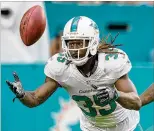  ?? ALLEN EYESTONE / THE PALM BEACH POST ?? Dolphins defensive back Walt Aikens downs a punt inside the fiveyard line during a 2016 game. A fifth-year player, Aikens downed five kicks inside the 20 last season.