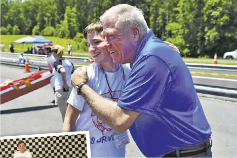  ?? BY IAN CHINI FOR THE CULPEPER TIMES ?? Thom Pellikaan poses here with Masters Division Champion Jeremiah Foscato of Amissville. And left, with his winning car.