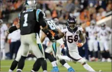  ?? GREGORY PAYAN — THE ASSOCIATED PRESS ?? Denver Broncos’ Von Miller (58) lines up the Carolina Panthers’ Cam Newton (1) on a rush during the Super Bowl 50Sunday in Santa Clara