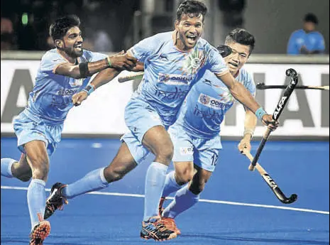  ?? AFP ?? Amit Rohidas (centre) celebrates after scoring against Canada in the hockey World Cup in Bhubaneswa­r on Saturday.