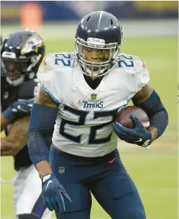  ?? NICK WASS/AP ?? Running back Derrick Henry, carrying the ball for the Titans against the Ravens in November 2020 at M&T Bank Stadium, has 9,502 career rushing yards.