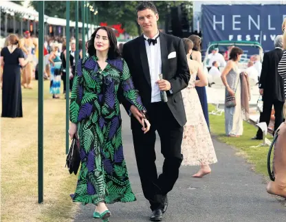  ??  ?? Seeking sanctuary: Hannah and her boyfriend mingle with VIP guests at the Henley Festival