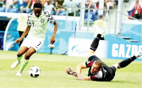  ??  ?? Eagles’ forward Ahmed Musa dribbled past Iceland goalkeeper, Hannes Hall Halldorsso­n. Onigbinde says poor tactical discipline affected the team in Russia. PHOTO: FEMI ADEBESIN-KUTI