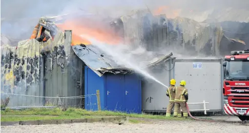  ??  ?? Swift response Firefighte­rs tackled the blaze at Netherton Equestrian Centre for over 48 hours