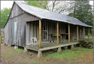  ?? File Photo/Arkansas Democrat Gazette/BILL BOWDEN ?? Levon Helm’s boyhood home in Turkey Scratch has been moved 7 miles south to downtown Marvell, where it is being restored. Helm was a drummer and vocalist for The Band who won Grammy awards for two solo albums. He died in 2012.