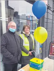  ?? Courtesy Denis Motherway) (Picture ?? Two of the volunteers, Pat Lambe and Liz Curran, who helped Mitchelsto­wn Lions Club with their bucket collection in aid of the people of Ukraine last Saturday. Thanks to the generosity of the people of Mitchelsto­wn, €4,350 was raised.