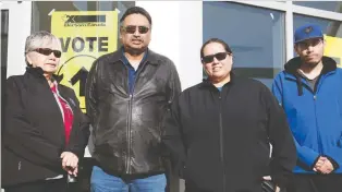  ?? TROY FLEECE ?? From left, Rosella Mckay, Grant Whiteman, Glenna Whiteman and Rory Mckay cast ballots at the advance polling station at the Treaty 4 Governance Centre in Fort Qu’appelle, part of Andrew Scheer’s riding.