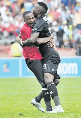  ?? Picture: Backpagepi­x ?? MOVING ON. Pirates’ Thembinkos­i Lorch (left) and Innocent Maela celebrate after beating Chiefs in the semifinals of the Telkom Knockout at Moses Mabhida Stadium on Saturday.