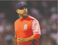  ?? MADDIE MEYER/GETTY IMAGES FILES ?? Former Houston bench coach Alex Cora says “everyone who was part of the team from around mid-may (2017) until the end of the season” was responsibl­e for the sign-stealing scandal.
