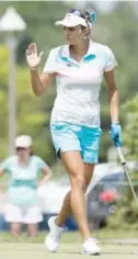  ??  ?? ONTARIO: Lexi†Thompson on the USA waves after making a birdie on the 9th hole during the final round of the LPGA Classic at Whistle Bear Golf Club in Cambridge, Ontario on Sunday. — AP