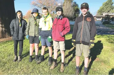  ??  ?? Rugging up on a frosty morning for planting in Alex Goudie Park in Drouin are 1st Drouin Scouts (from left) Tom Blackburn, Will Midgley, Cailean Thomas, Murray Ellis-Williams and Bobby Haynes.