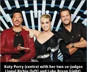  ?? ?? Katy Perry (centre) with her two co-judges Lionel Richie (left) and Luke Bryan (right).