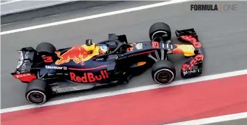  ?? AFP ?? Red Bull’s Daniel Ricciardo drives at the Circuit de Catalunya in Montmelo on Monday, the first day of the pre- season testing for the Formula One season. —