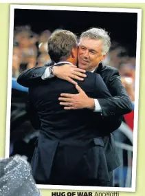  ??  ?? HUG OF WAR Ancelotti embraces Rodgers after his old team Liverpool lost 1-0 to Real Madrid at the Bernabeu in 2014
