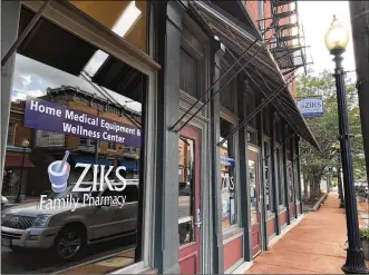  ?? CORNELIUS FROLIK / STAFF ?? Zik’s Home Healthcare is expanding, potentiall­y bringing 250 new jobs to the Wright Dunbar Business District as it adds skilled home health care services.