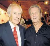  ?? Kevin Mazur
WireImage ?? GEORGE MARTIN, left, and Beach Boy Brian Wilson at the Mirage Hotel and Casino in Las Vegas.