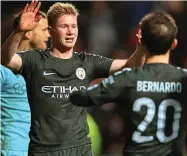  ??  ?? Clincher: De Bruyne after his late strike