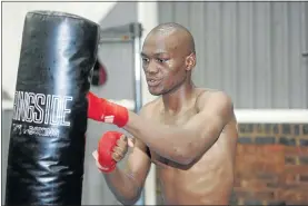  ?? PHOTO:VELI
NHLAPO ?? OPTIMISTIC: Nkululeko Mhlongo ’ s dream of challengin­g for a world title has come to fruition. He challenges WBF middleweig­ht champion Isaac Rodriguez in Brazil tomorrow