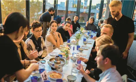  ?? CHANG W. LEE/THE NEW YORK TIMES 2022 ?? A pre-wedding party at Ginn-laoo, a casual bistro specializi­ng in the cuisine of Thailand’s northeaste­rn Isan region.