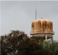  ?? Associated Press ?? ■ ABOVE: This April 13, 2018, photo shows the water tower in Elaine, Ark. Elaine was the site of one of the largest racial mass killings in U.S. history. The massacre has been unrecogniz­ed for decades. Some say that will change with a memorial honoring those killed in 1919.