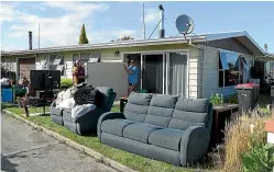  ?? JOHN HAWKINS/STUFF ?? Mataura residents return to clear out their flooded houses after they were evacuated during a state of emergency earlier this week.