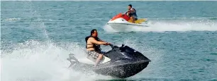  ?? File photo ?? The Sharjah Municipali­ty has warned rental firms to ensure that safety norms, including wearing life jacket and riding the jet ski within the specified places, are met by the riders. —