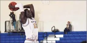  ?? New Haven Athletics / Clarus Multimedia Group ?? Majur Majak, a 7-foot-1 center from South Sudan, has 52 blocks through 17 games and is on pace to break the New Haven single-season record, 75, set by Eric Anderson in 2013-14.
