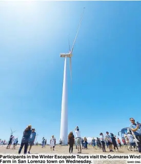  ?? GHIO ONG ?? Participan­ts in the Winter Escapade Tours visit the Guimaras Wind Farm in San Lorenzo town on Wednesday.