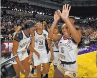  ?? Richard Shiro The Associated Press ?? Mississipp­i State’s Anriel Howard (5) and her teammates celebrate their SEC tourney title and NCAA Tournament bid.