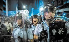 ?? ISAAC LAWRENCE/GETTY-AFP ?? Hong Kong has seen unrest in support of two separatist lawmakers now barred by China.