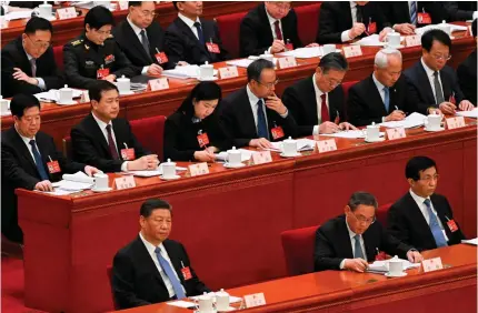  ?? AFP PHOTO ?? NATIONAL SECURITY
China’s President Xi Jinping attends the second plenary session of National People’s Congress (NPC) at the Great Hall of the People in Beijing on Friday, March 8, 2024.
