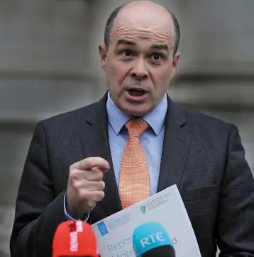  ??  ?? RECOVERING: Denis Naughten hopes to be back at his desk within the next couple of weeks. ‘I just happened to be in the wrong place at the wrong time,’ he says.