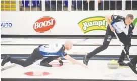  ??  ?? Brad Jacobs of Sault Ste. Marie, Ont., throws a stone against Brad Gushue’s rink on his way to the title at the Grand Slam of Curling event in Pictou County on Nov. 14. Jacobs won this game 6-4 to claim the championsh­ip.