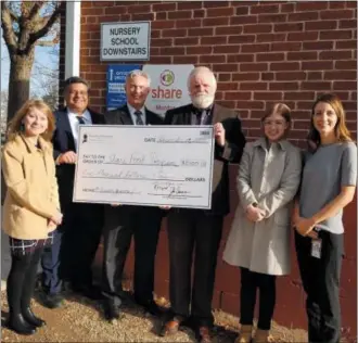  ?? SUBMITTED PHOTO ?? Tower Health recently donated a total of $15,000 to three area food banks following the conclusion of its TowerGimme­Five social media campaign. In this photo, Tower Health presents $5,000 to Share Food Program, King of Prussia. Shown here, left to right are: Jill Zelinsky, assistant director of nutrition, Reading Hospital; John Cacciamani, MD, president &amp; CEO, Chestnut Hill Hospital; Richard Newell, president &amp; CEO, Pottstown Hospital; Patrick Druhan, Share Food Program; Madeleine Weko, Share Food Program; and Sarah Luber, DO, Tower Health Wellness medical director.