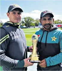  ??  ?? Historic match: Ireland’s William Porterfiel­d and Sarfraz Ahmed of Pakistan ahead of today’s Test