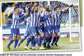  ??  ?? DOUBLE UP: Will Keane and his teammates celebrate Sheffield Wednesday’s second