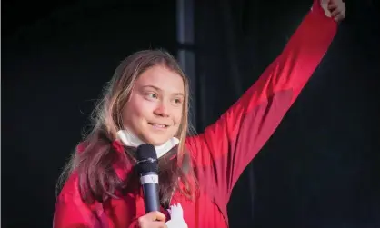  ?? Photograph: Christophe­r Furlong/Getty Images ?? Greta Thunberg speaking at climate rally in Glasgow on Friday, at which she called Cop26 ‘a failure’ and a ‘greenwash festival’.