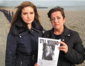  ??  ?? PLEASE HELP: Esra’s sister, Berna Fidan, and Berna’s daughter, Ayda, in Bray, holding a new missing person poster appealing for informatio­n on the wherabouts of Esra Uyrun (top right). Right, a CCTV image of her Twingo on its last trip