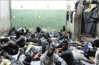  ??  ?? An overcrowde­d cell in the Al Nasr detention centre for refugees in Zawiyah, Libya.