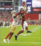  ?? RICK SCUTERI — ASSOCIATED PRESS ARCHIVES ?? Larry Fitzgerald, catching the game-winning TD in OT versus the 49ers on Oct. 1, signed a one-year extension Friday, even though he hasn’t said whether he’ll play beyond this season.