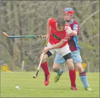  ?? Photograph: Donald Cameron. ?? Ewen MacKinnon, Inverness, gets to the ball before Niall McCallum of Strathglas­s during last weekend’s Strathdear­n Cup tie.