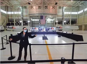  ?? JOE RONDONE/THE COMMERCIAL APPEAL ?? Preparatio­ns are made at the Air National Guard 164th Airlift Wing in Memphis prior to the arrival of Vice President Mike Pence for a roundtable discussion about Operation Warp Speed on Thursday.